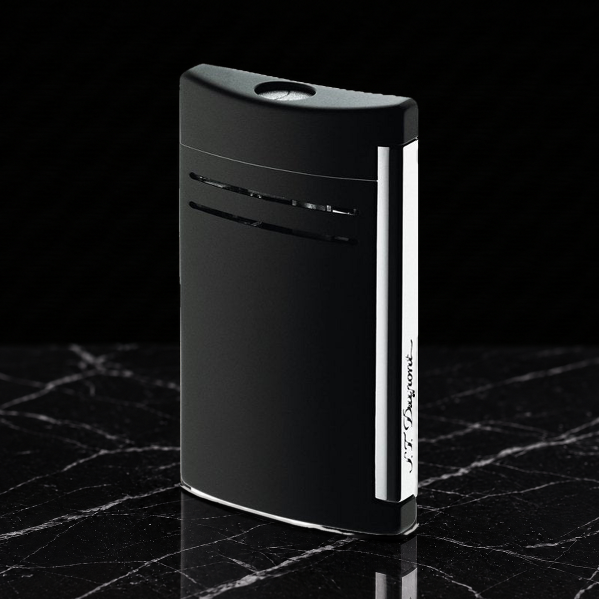 S.T. Dupont Maxijet torch lighter in matte black with chrome trim, front view on black marble