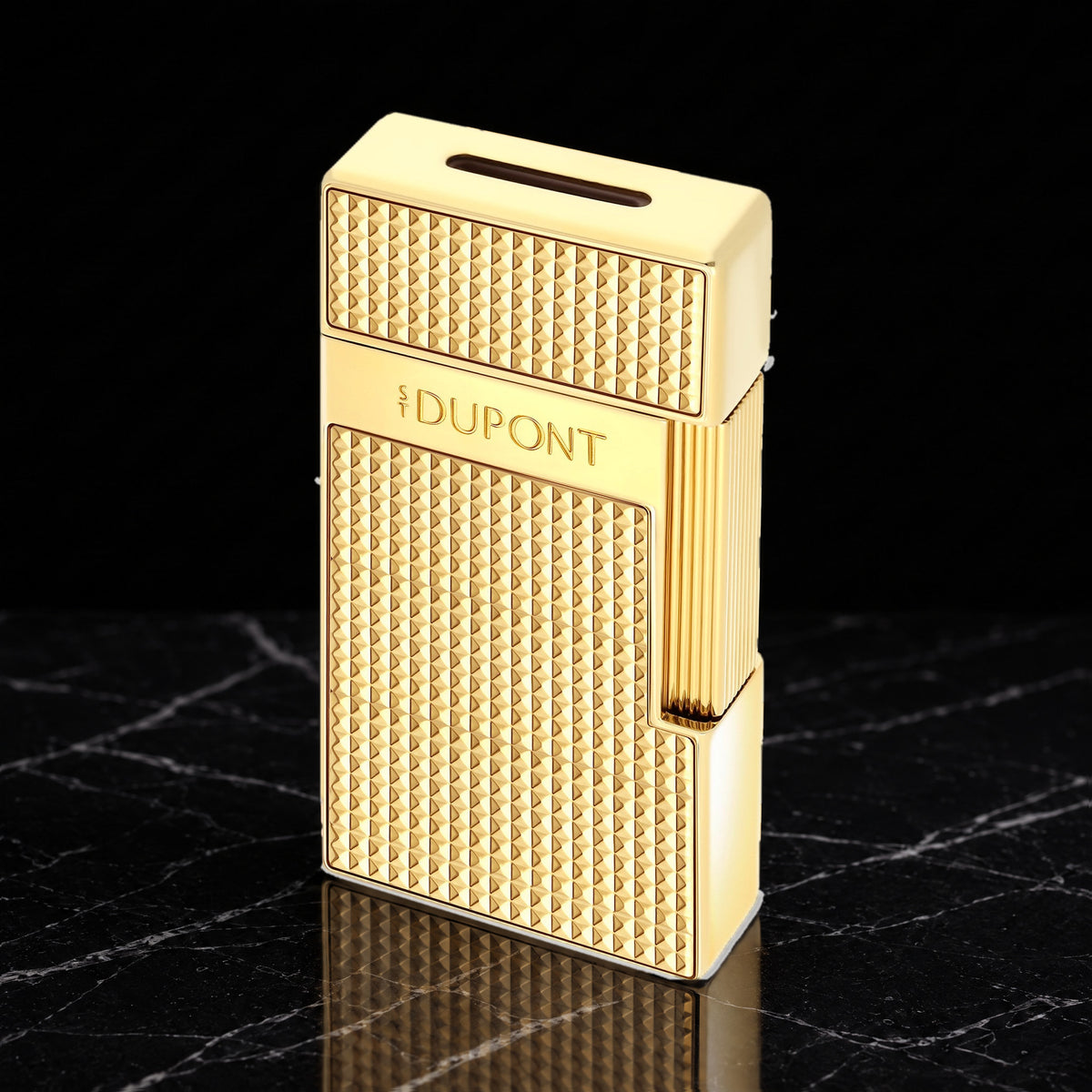 S.T. Dupont Biggy torch lighter in gold with Diamond Head guilloché, three-quarter view, cap closed