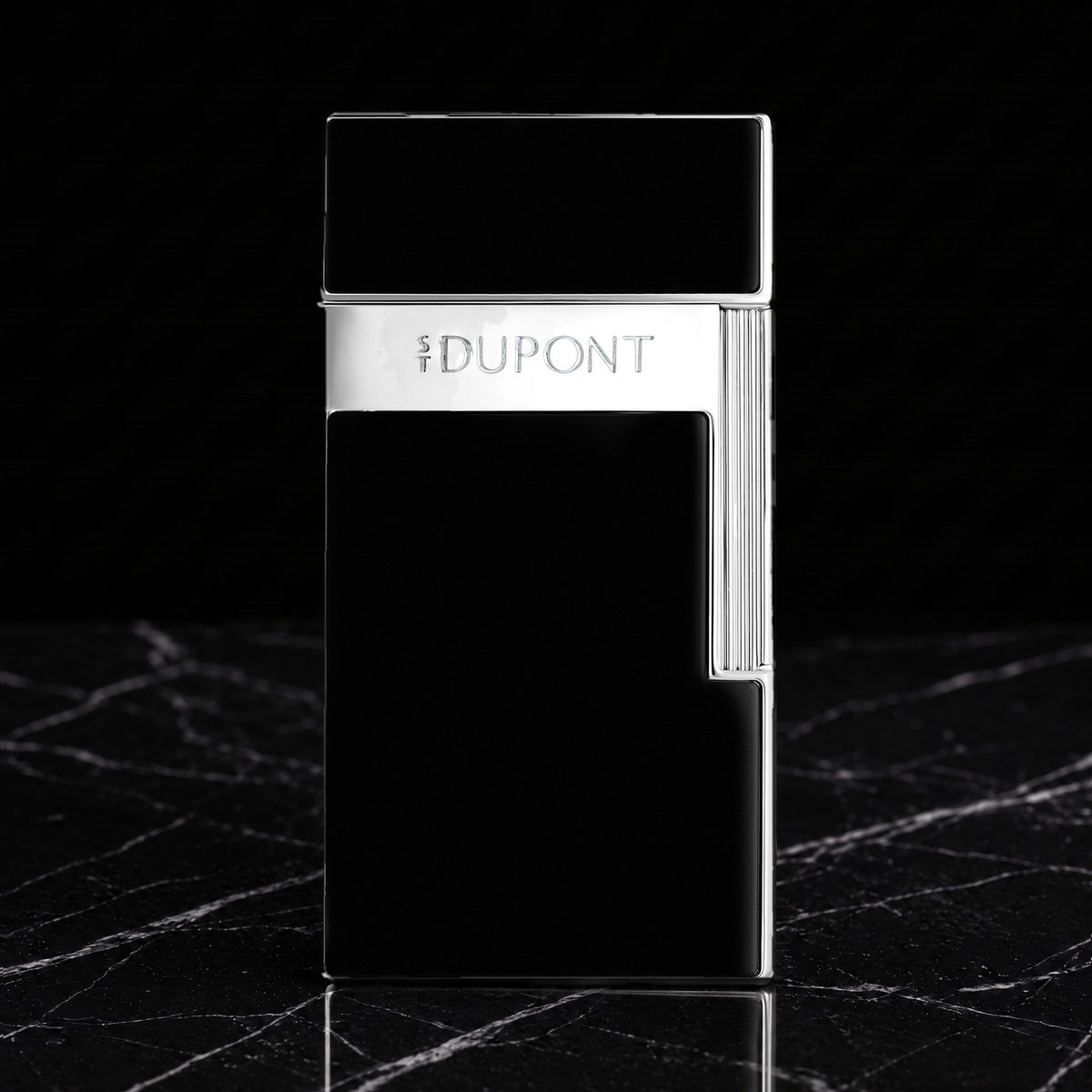S.T. Dupont Biggy torch lighter in black lacquer with chrome trim, front view, cap closed