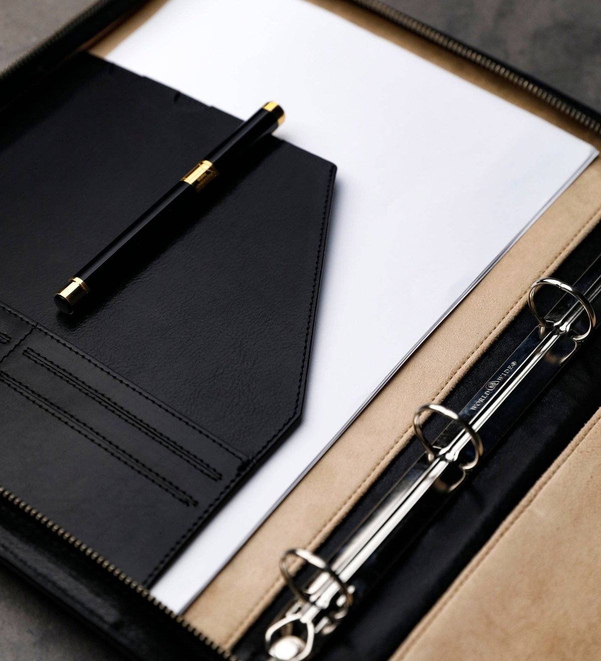 Joy in the Morning — open interior with binder rings, notepad, and pen