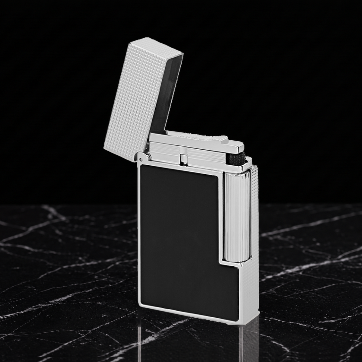 S.T. Dupont Ligne 2 Perfect Ping lighter in black lacquer with palladium trim, hinged cap open above the burner