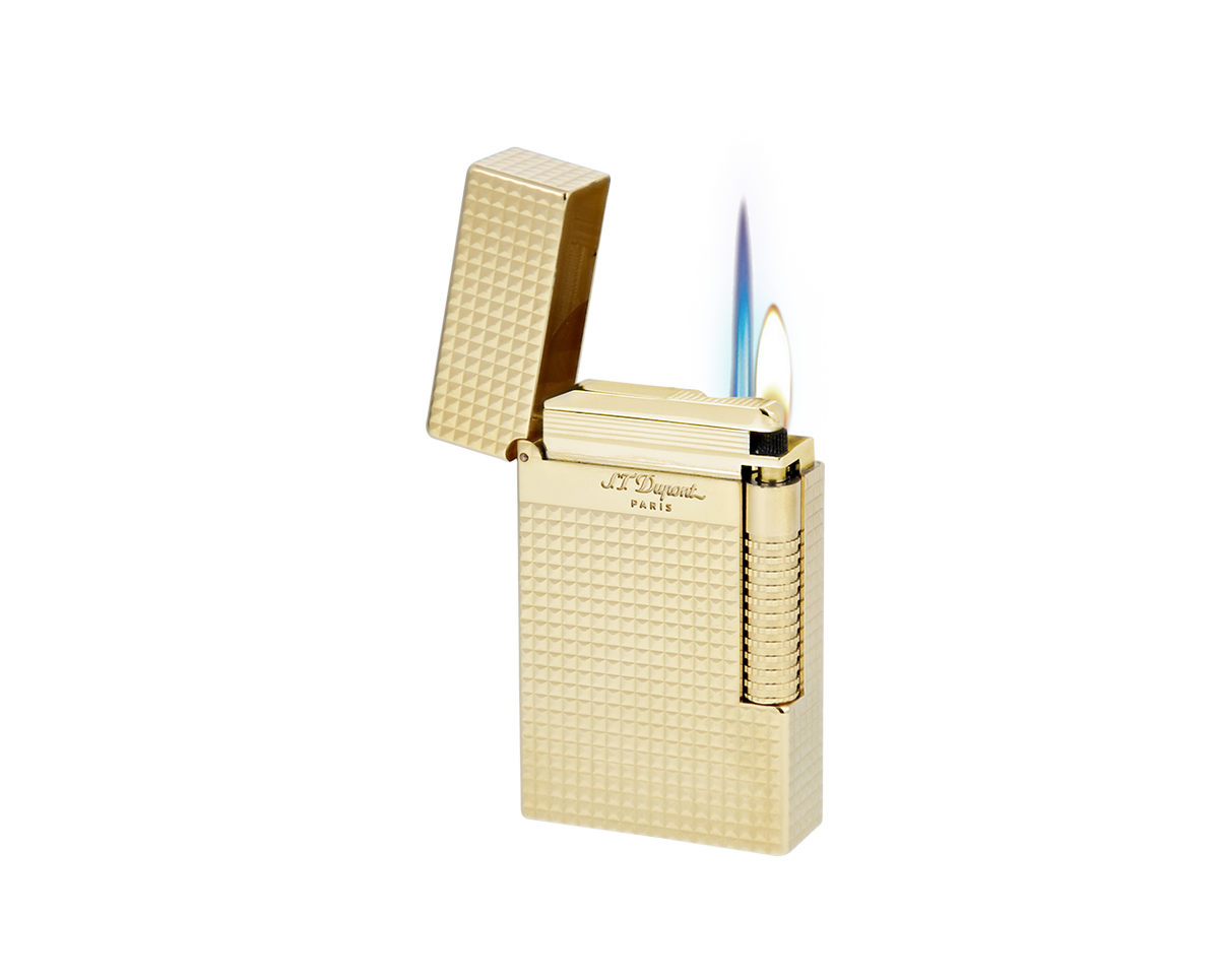 S.T. Dupont Le Grand lighter in yellow gold, shown lit with the cap open