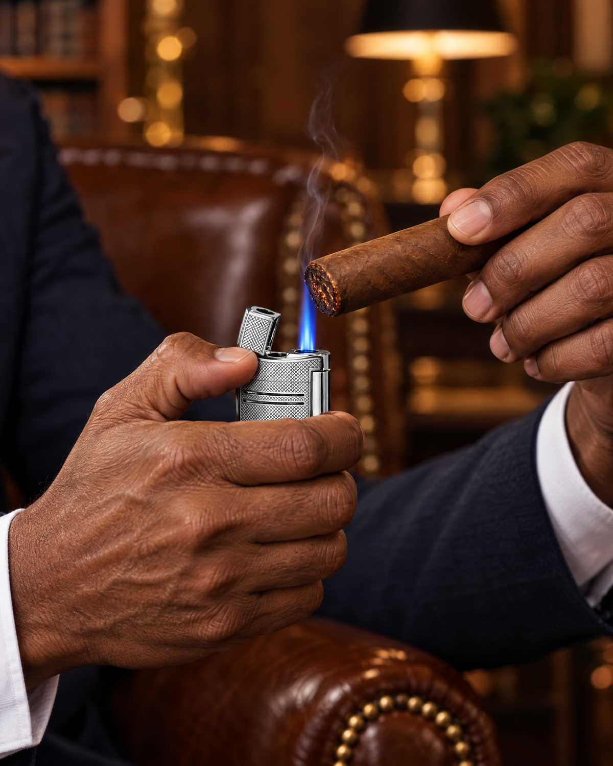 S.T. Dupont Maxijet Lighter — Chrome Grid, torch flame toasting a freshly cut cigar in a steakhouse cigar room