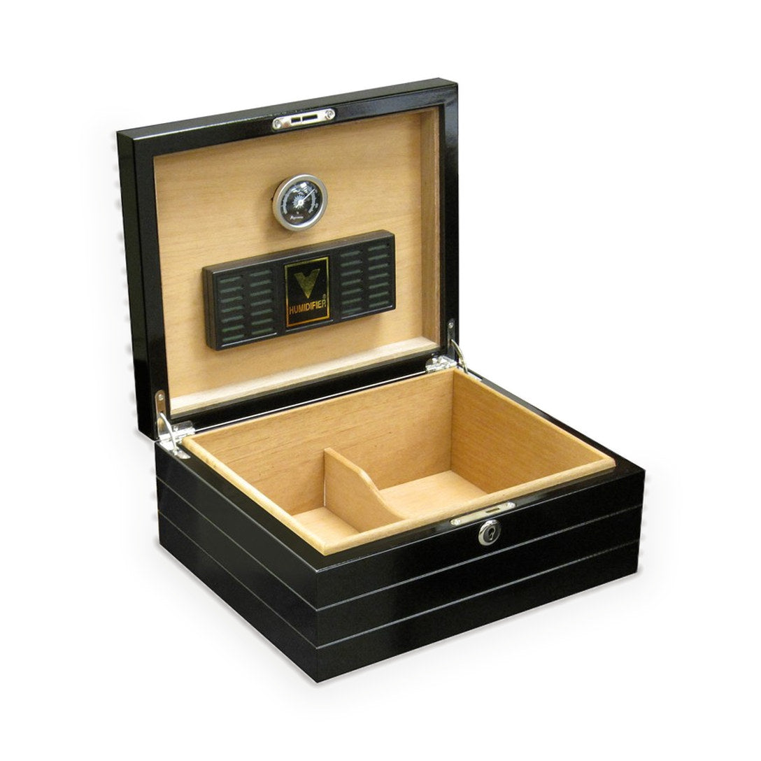 The Onyx humidor open, cedar interior with hygrometer and humidifier in the lid