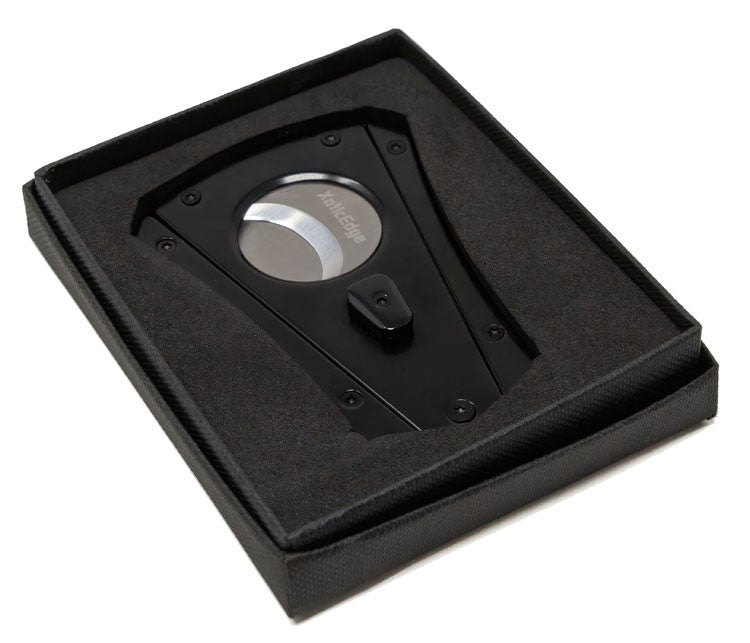 The XhaleX cutter seated in its fitted gift box insert, shown at an angle