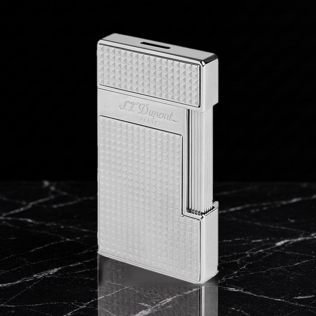 S.T. Dupont Slimmy torch lighter in chrome with Diamond Head guilloché, three-quarter view, cap closed