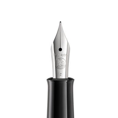 Close-up of the Pelikan P205 nib, engraved with the Pelikan pelican logo and marked F for the Fine width