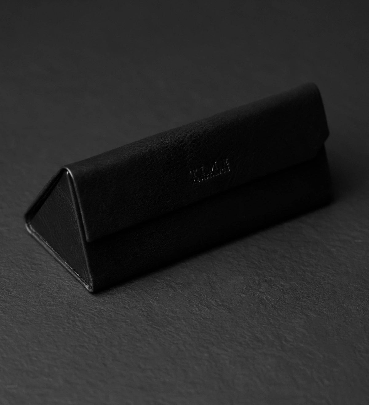 The Riddle of the Sands black leather glasses case in Italian Vachetta (Time Resistance) — view 3