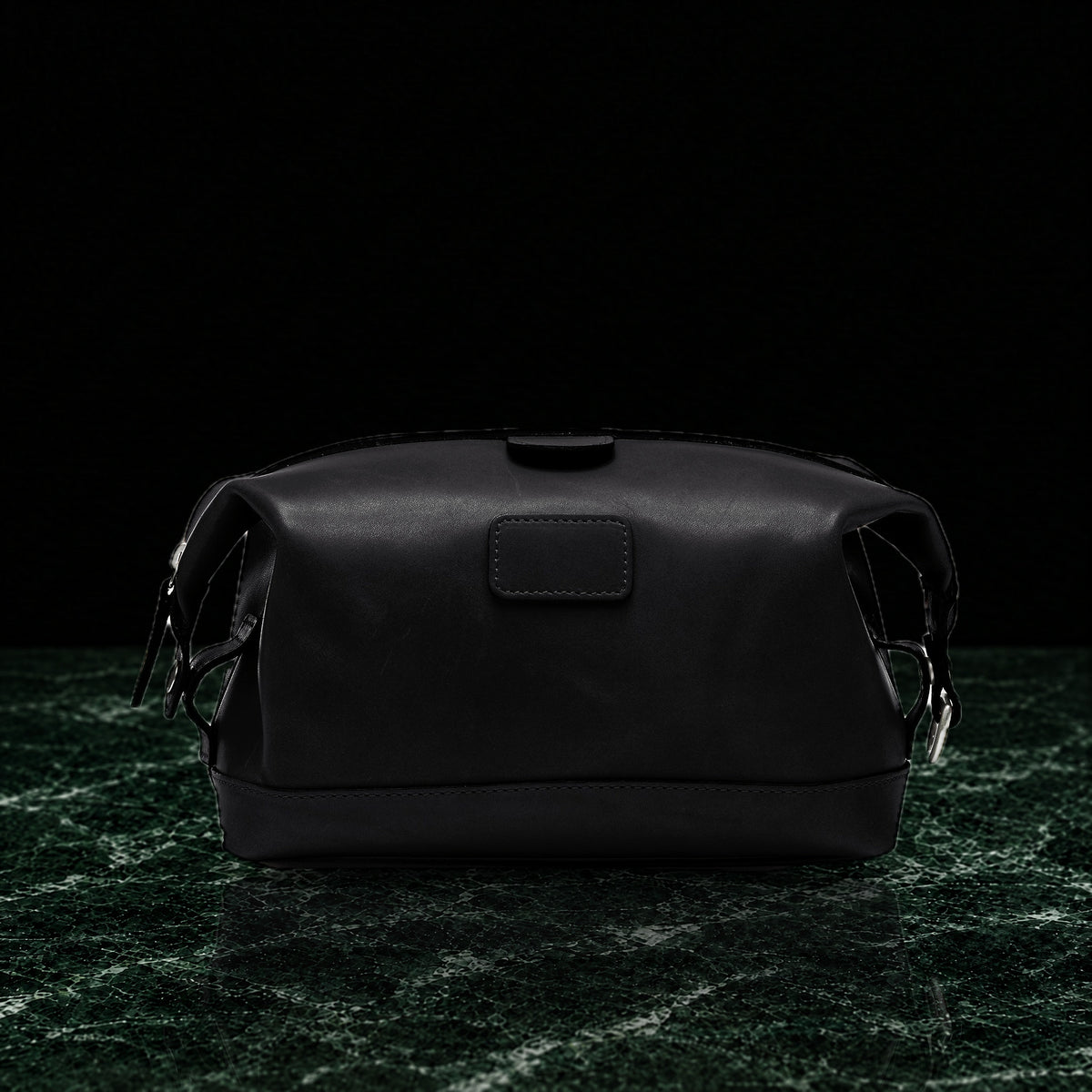Ryder full-grain leather dopp kit in black, front view