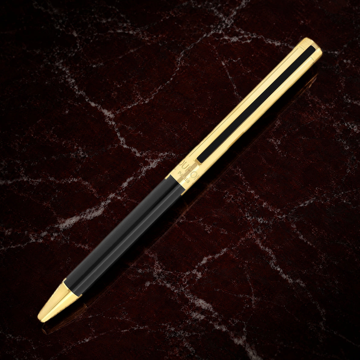 S.T. Dupont Classique ballpoint in black lacquer with gold finish, shown full length