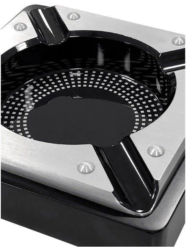 Saint Lucia metal cigar ashtray, angled view showing the four wide rests