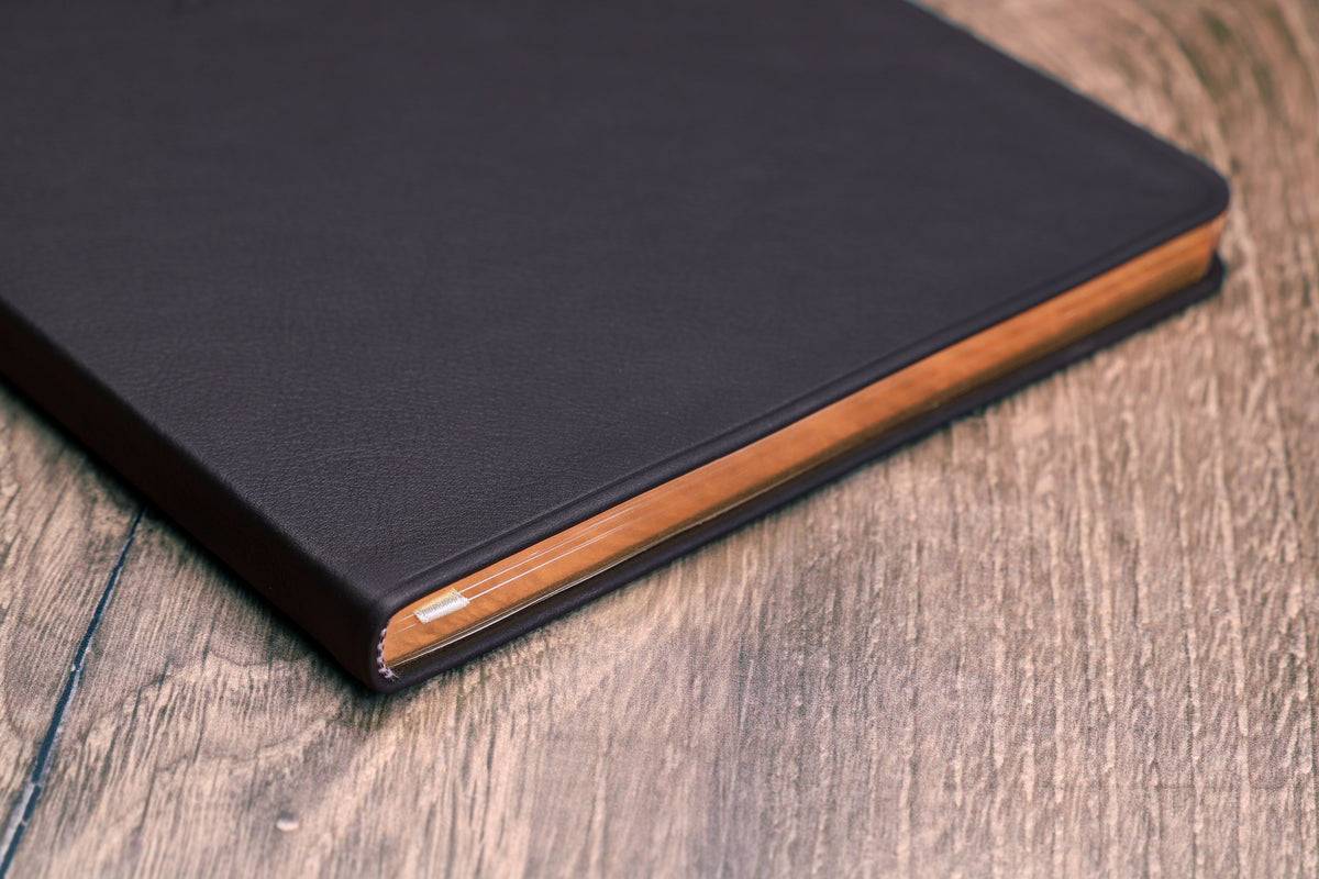 Desk Leather Journal — gilded page edges and rounded corners, close-up