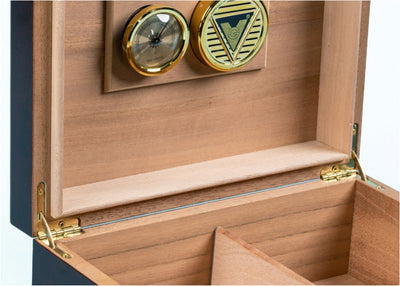 Diplomat humidor open from above, hygrometer and humidifier in the lid