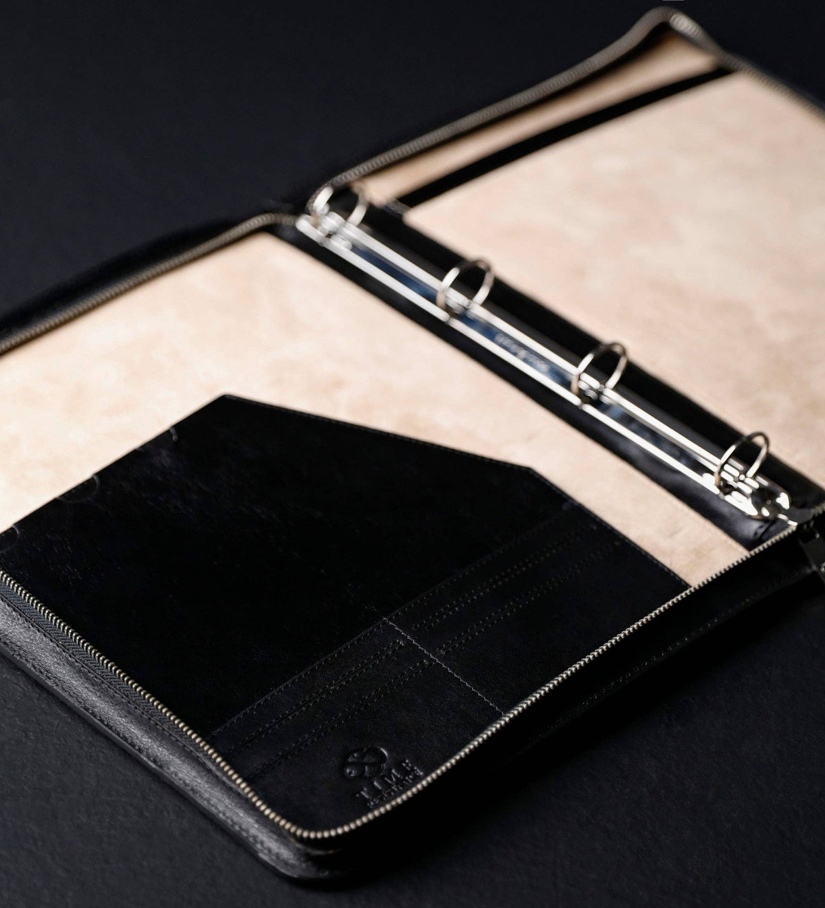 Joy in the Morning — open flat, showing the four-ring binder mechanism and interior organizer panel