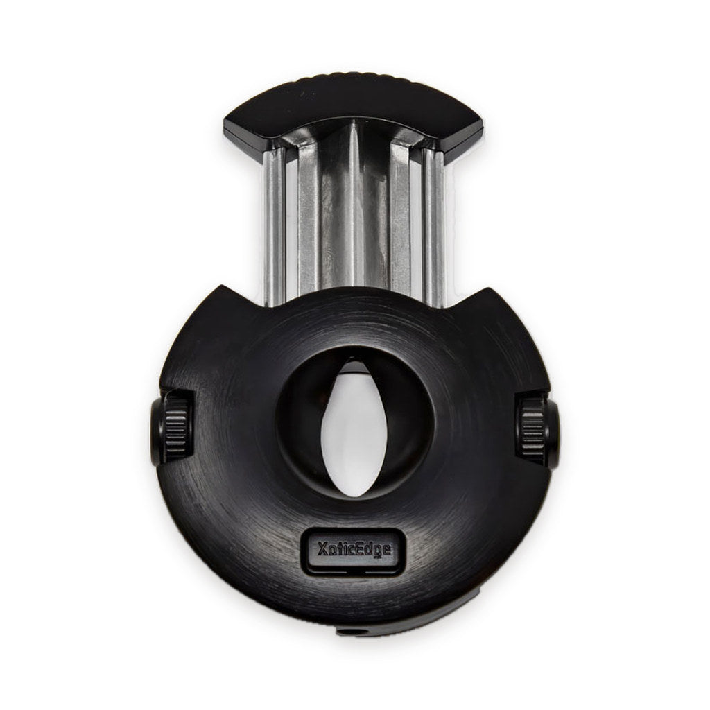 The Xceed cigar cutter with its stainless steel guillotine blade extended, ready for a V-cut