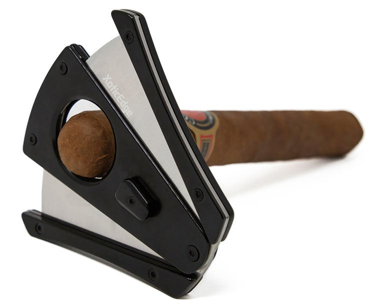 A cigar seated in the open XhaleX cutter, showing the 64 ring gauge capacity; cigar not included